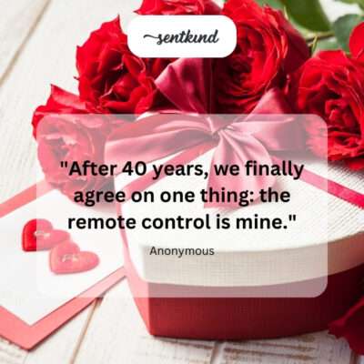 A hand firmly holding a remote control.