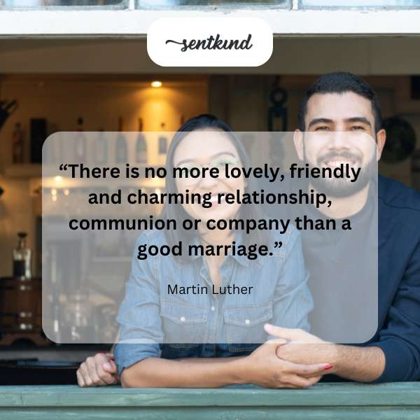 A happy couple smiles warmly at each other during their wedding ceremony.