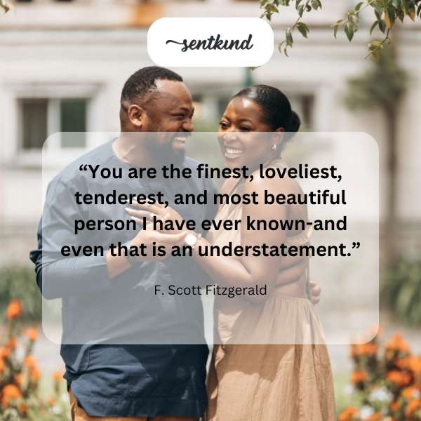 An open book displays a romantic quote in elegant cursive.