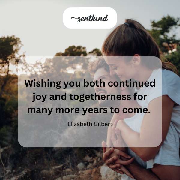 A happy couple is embracing in a sunlit garden.
