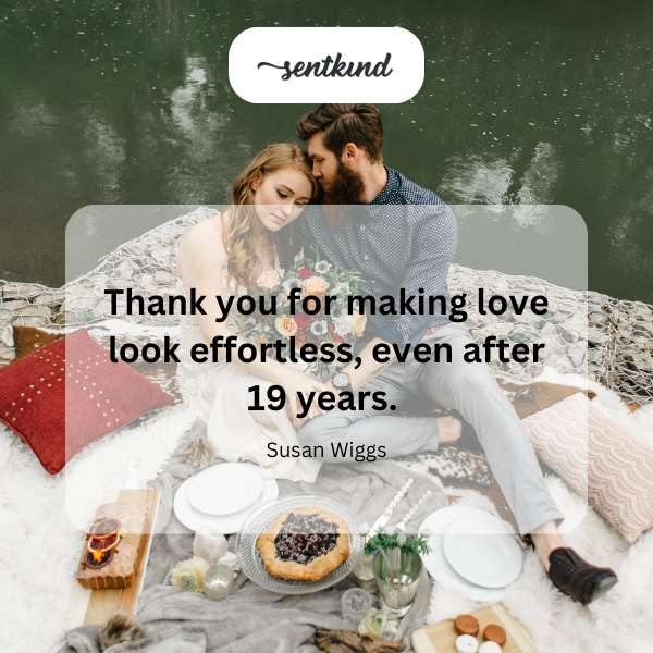 A couple is gently embracing in a sunlit garden, symbolizing enduring love.