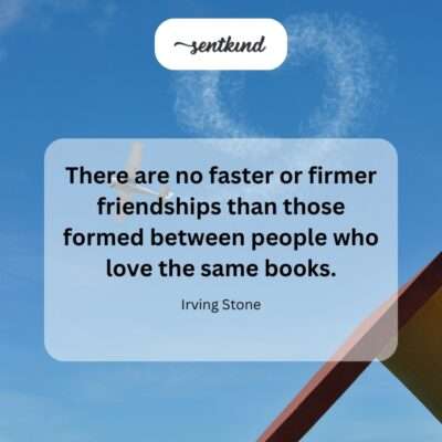 Two friends are comfortably seated together, surrounded by books, happily discussing a shared literary passion.