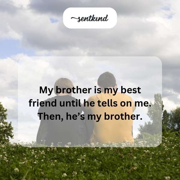 Two brothers, one smiling and the other looking betrayed, stand back-to-back.