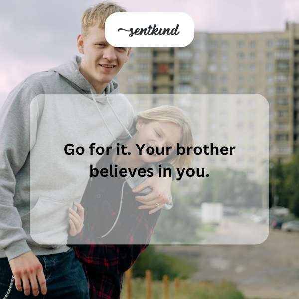 A young man looks determined with a supportive brother standing behind him.