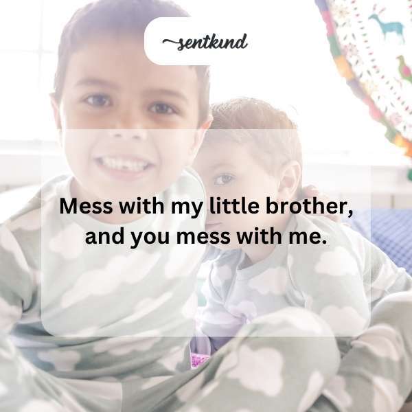 Two young siblings stand back-to-back, conveying a protective stance.