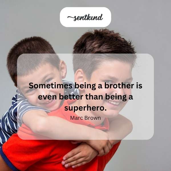 Two young boys are happily playing together, one dressed in a superhero cape.