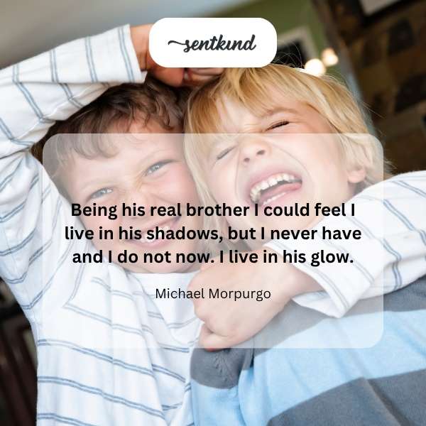 Two brothers standing side by side, one slightly illuminated more than the other.