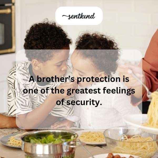 Two brothers stand side-by-side, the older one with his arm around the younger, both smiling confidently.