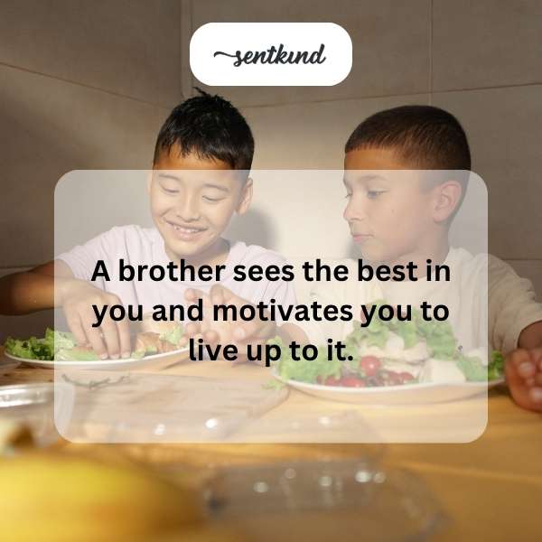 Two brothers are smiling and giving each other a supportive high-five.
