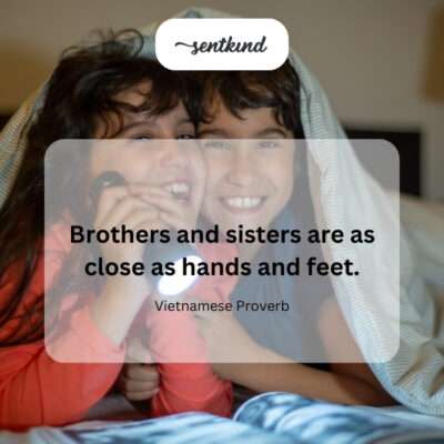 Brother and sister holding hands.