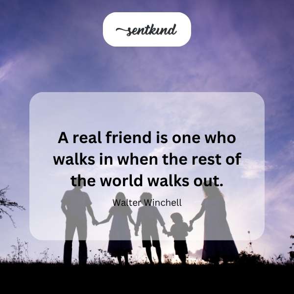 A supportive figure walks towards another person sitting alone on a park bench.