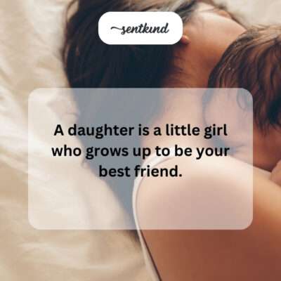 A mother and adult daughter laughing together.