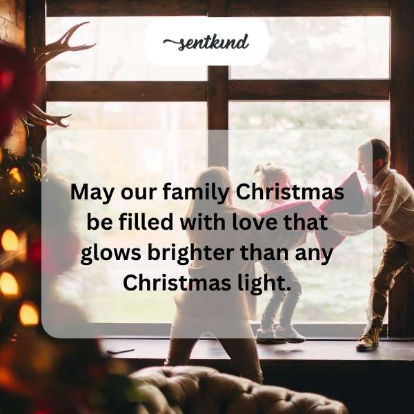 A warmly lit family gathers around a Christmas tree adorned with glowing lights.