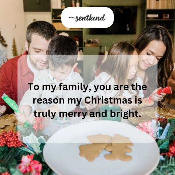A warmly lit Christmas tree surrounded by a family opening gifts.