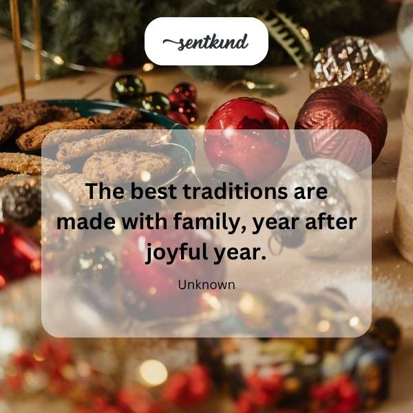 A multigenerational family smiles together while decorating a Christmas tree.