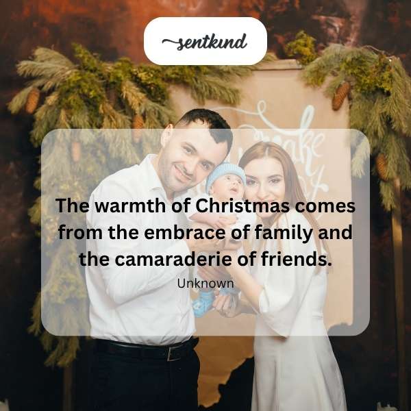 A group of diverse people are gathered around a decorated Christmas tree, smiling and laughing.