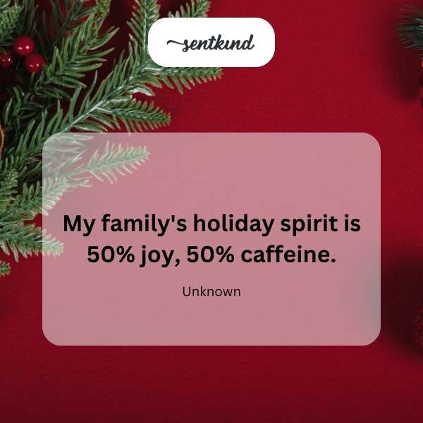 A smiling family gathers around a table filled with coffee cups and festive decorations.