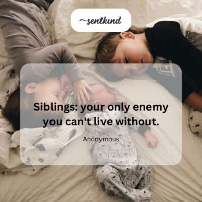 Siblings playfully wrestling.