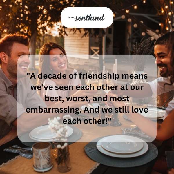 Two friends are laughing while signing a humorous, oversized 'Friendship Contract' that reads '10 Years' at the top.