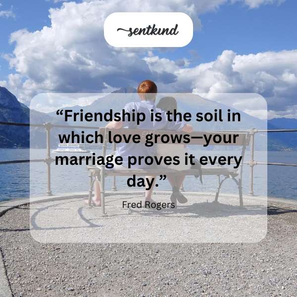 A couple holding hands in a blooming garden.