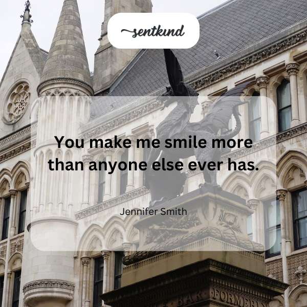 A person's joyful face radiates happiness with a wide, genuine smile.