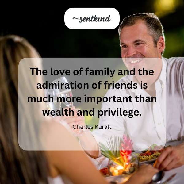 A diverse group of people are joyfully embracing each other, symbolizing familial love and friendship.