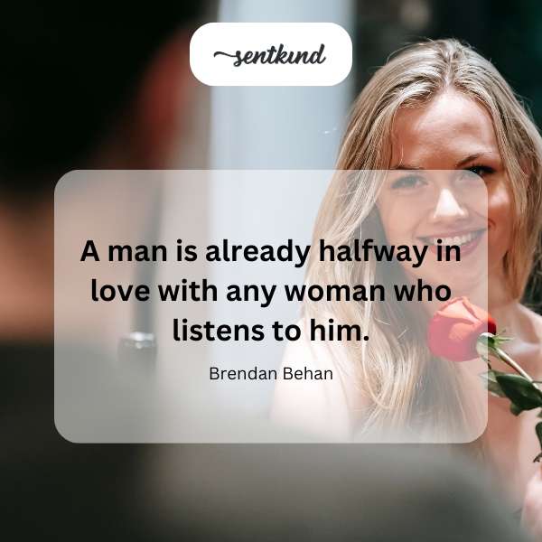 A man leans in, speaking intently to a woman who is listening attentively.