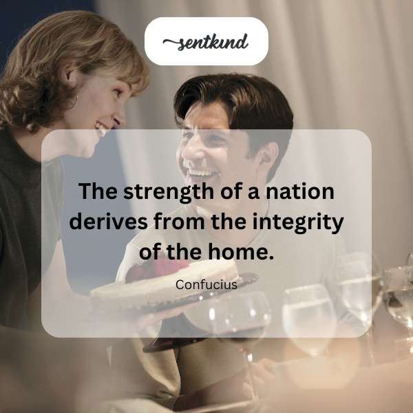 A family is sharing a meal together at their dining table in a warm, inviting home.