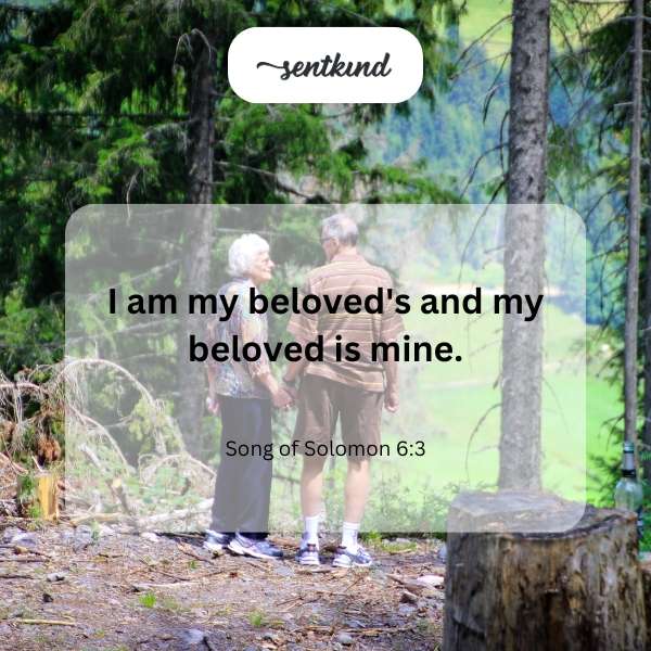 A couple lovingly embraces in a blooming garden.