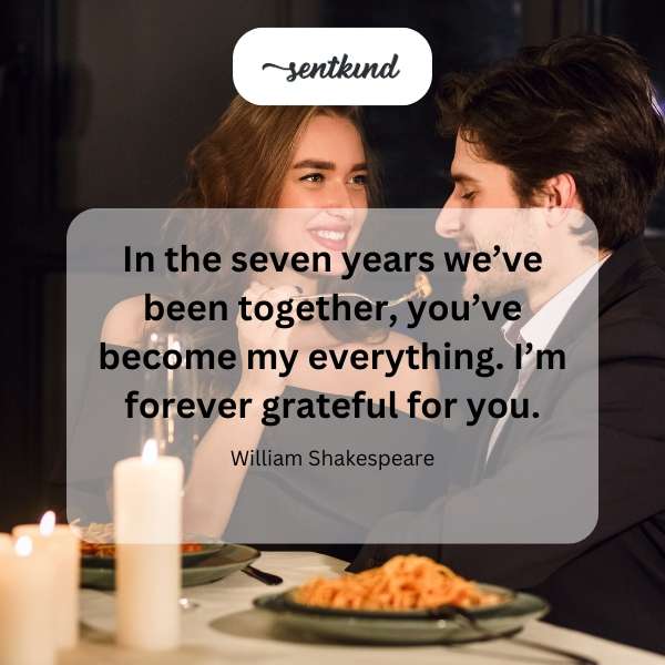 Couple embracing intimately against a soft, romantic background.