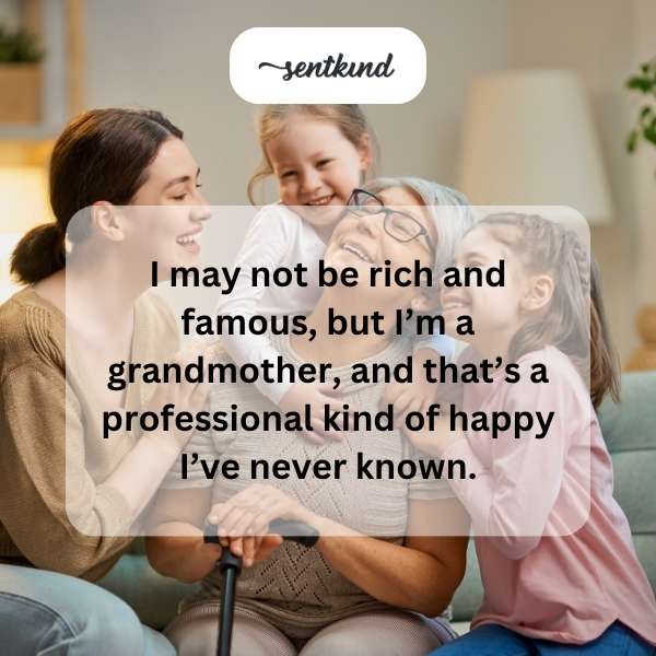 A smiling grandmother gently holds her baby grandchild close.