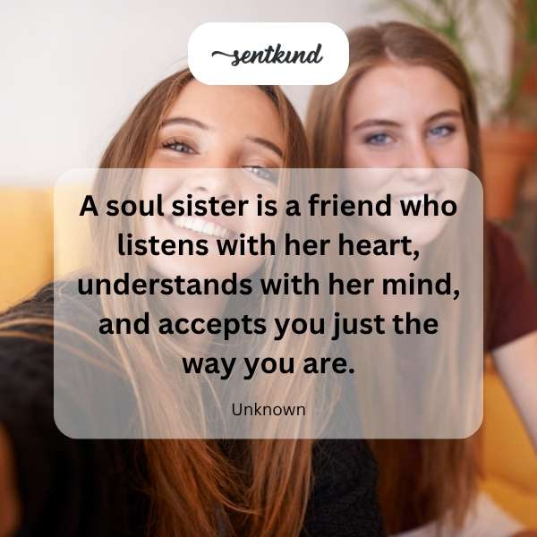 Two women sit side-by-side, sharing an intimate conversation with expressions of warmth and deep understanding.