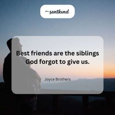 Two smiling friends are sharing a close moment together, looking happy and comfortable.