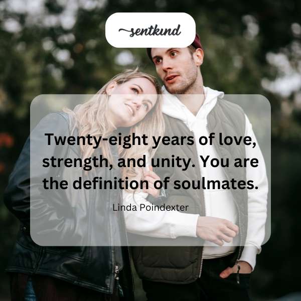 A couple embracing, celebrating their anniversary, with intertwined hands symbolizing their strong bond.