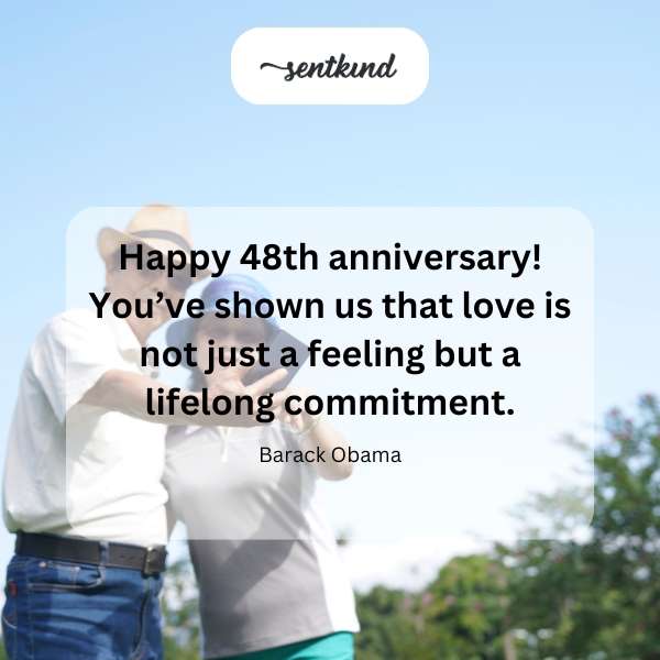 A couple joyfully celebrating their anniversary with a loving embrace.