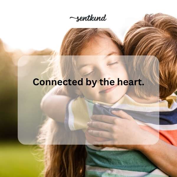 Two hands gently touch, with a glowing line forming a heart shape connecting them in the center.