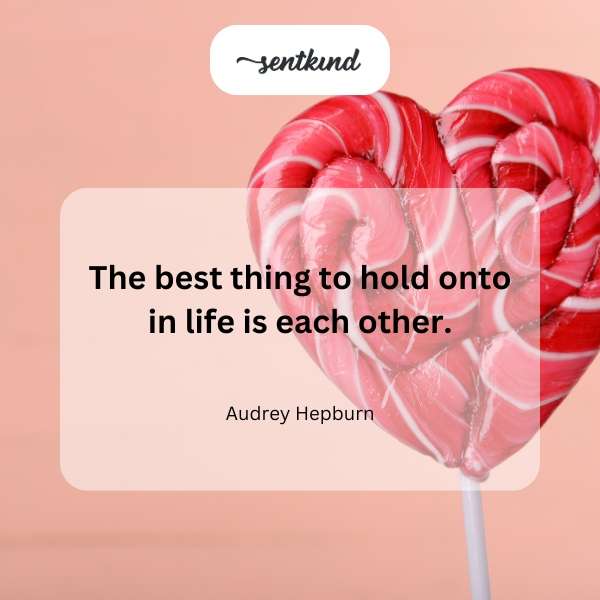 A close-up image showcasing two hands intertwined, symbolizing connection and support.
