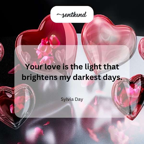 A brightly lit candle illuminates a dark room.