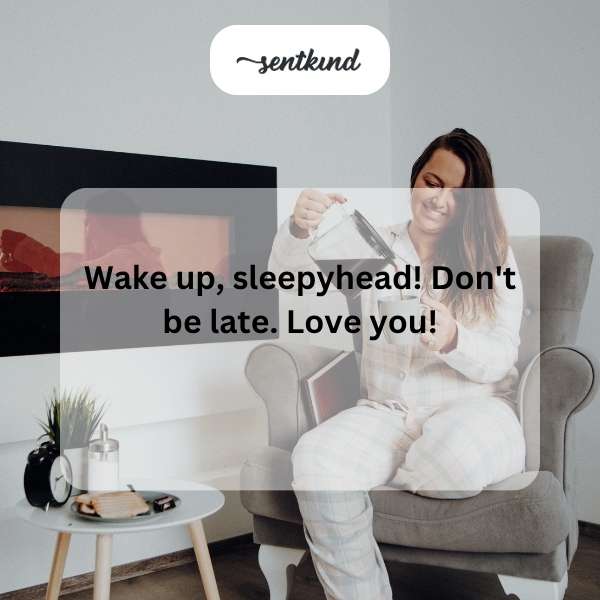 A person is gently waking up a sleeping person in bed.