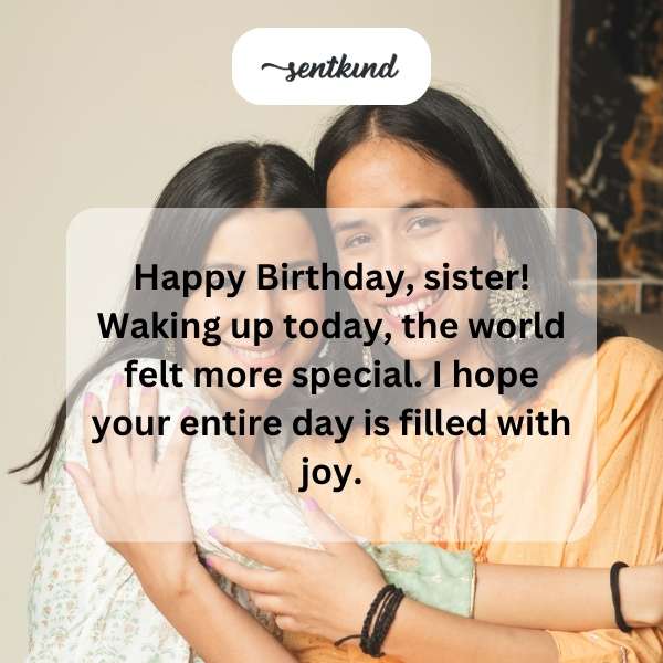 A person is celebrating their birthday with a festive cake.