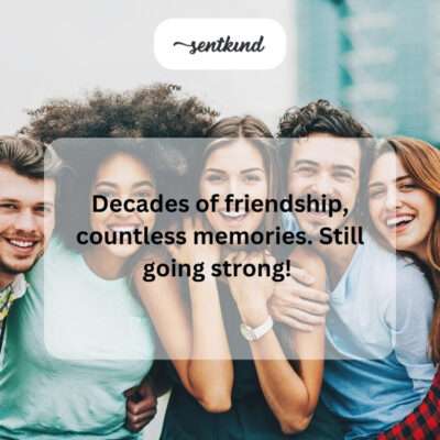 A group of five adults who are childhood friends laughing together outdoors, possibly recreating an old photo.