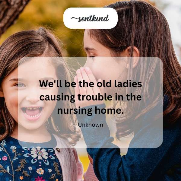 Two elderly women share a knowing glance and mischievous smiles, hinting at future playful trouble.