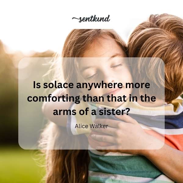Two sisters share a warm embrace, their bond clearly visible in the comforting gesture.