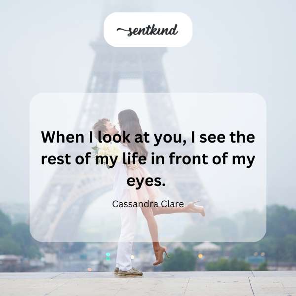 A couple gazes lovingly into each other's eyes.