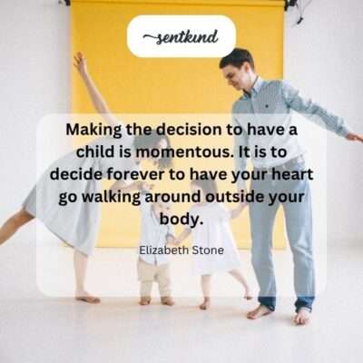A parent's hands cradle a baby's feet, symbolizing the heart now existing outside the body.