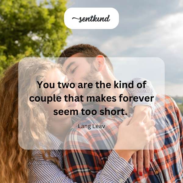 A happy couple embraces lovingly under a soft, romantic light.