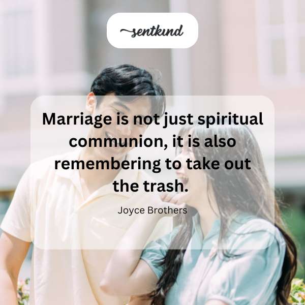 A couple smiles while one partner carries a trash bag outside.