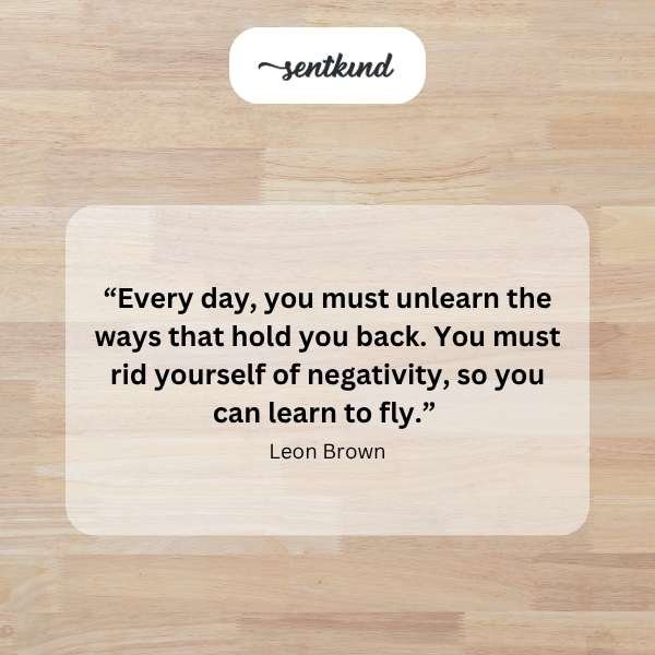 A clear upward path ascends a gentle hill, leaving scattered rocks and debris far below the rising track.