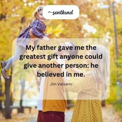 A man's hand rests gently on the shoulder of a child or young person, symbolizing paternal support and encouragement.