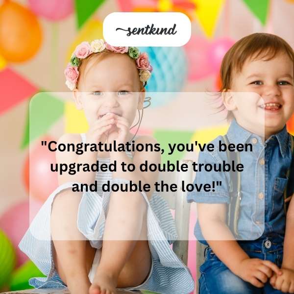 Two babies in matching outfits are being held by their parents.